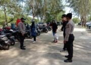 Hiraukan Hari Libur Akhir Pekan, Kapolsek Indrapura Pimpin Patroli Prokes di Objek Wisata