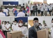 Bupati dan Ketua  TP PKK Salurkan Bantuan Prokes di Disdik Sergai 