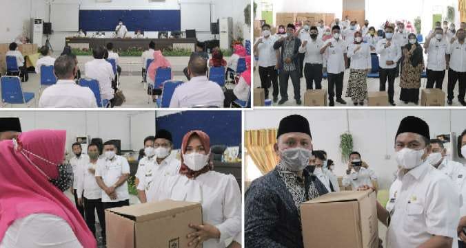 Bupati dan Ketua  TP PKK Salurkan Bantuan Prokes di Disdik Sergai 