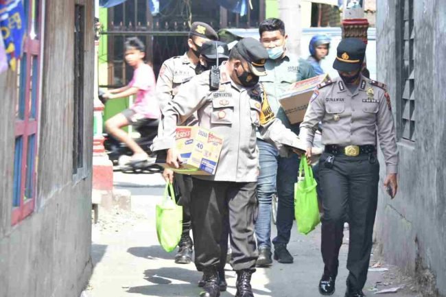 Waka Polres Belawan Kompol Herwansyah Putra SH MSi, Kunjungi Bocah Penderita Hedrocepalus