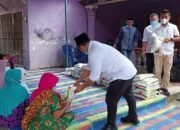 Di Kampung Lolotan Kadin Berbagi Serahkan Bantuan Sembako, Sekaligus Ajak Warga Untuk Melakukan Vaksinasi