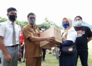 Dukung Penguatan Prokes Jelang Nataru, Forum Wartawan Unit Pemprov Sumut Bakti Sosial Bagikan Masker dan Hand Sanitizer