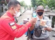DPC PSI Belawan Bagikan Ratusan Rice Box Kepada Warga