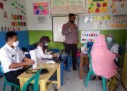 Kapolsek Banjaran Pantau Pelaksanaan Vaksinasi di Desa Suniabaru