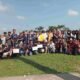 Anggota Karang Taruna Mekar Sari poto bersama sebelum lakukan penggalangan dana, Kabupaten Batu Bara, pada Minggu (26/12/2021) pagi. (kedannews.com/Nedy).