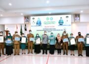 Ketua TP PKK Sumut Serahkan Penghargaan Pelaksana Terbaik PTP2W-KSS 2021