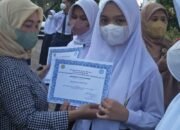 SMP Negeri 7 Medan Bagikan Buku Raport dan Gelar Vaksinasi