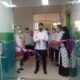 Wabup Sergai Memotong pita peresmian PCR. Rabu (26/01/2022).(foto/humas).