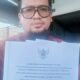Muhri Fauzi Hafiz sambil perlihatkan dokumen resmi pidato Gubsu. Kamis (27/1/2022). (Foto/Mery Ismail S.Sos)