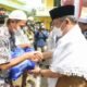 Ali Yusuf Serahkan Bantuan Paket Sembako di Ponpes NU Al-Qomariah