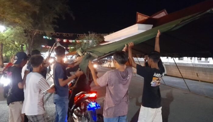 Tenda Vaksinasi Polres Langsa di Jalan Raya Makan Korban