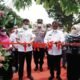 Bupati Sergai menggunting Pita peresmian Jalan Bajaronggi. Rabu (02/02/2022). (Foto/Humas).