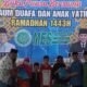 DPP BKPRMI saat memberikan bingkisan Ramadhan Kepada Ratusan Kaum Duafa dan Anak Yatim. (Foto/Humas).
