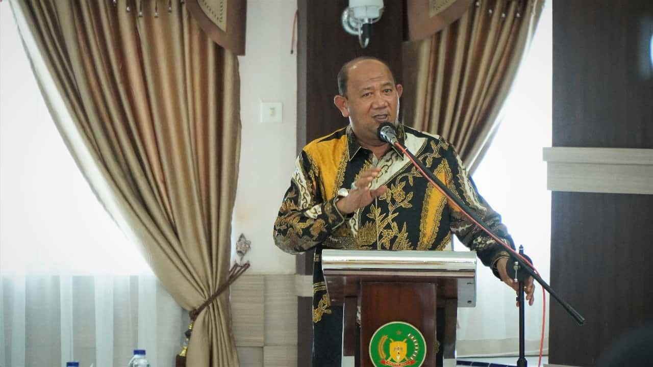 Plt Bupati Langkat Syah Afandin saat pidato sambutan. (Foto/Humas).