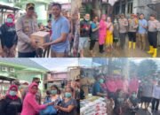 Wakapolrestabes Medan Serahkan Langsung Bantuan Banjir di Jalan Brigjen Katamso 