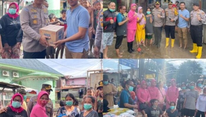 Wakapolrestabes Medan Serahkan Langsung Bantuan Banjir di Jalan Brigjen Katamso 