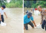 Wakapolsek Indrapura dan Anggota DPRD Batu Bara Berjibaku Tutup Tanggul Jebol