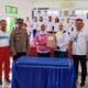 KIKKY Febriasi SH MKN, menerima SK Kepengurusan ASKI Sergai, Minggu (262). (Foto Muslim).