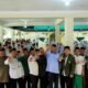 Syah Afandin foto bersama jajaran NU dan warga. (Foto : ist).