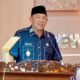 Plt Bupati Langkat Syah Afandin saat pidato beri jawaban atas pandangan Fraksi DPRD Langkat, Kamis (27/2023). (Foto : ist).