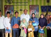 Plt Bupati Langkat Bagikan 300 Paket Sembako untuk Masyarakat Terdampak Abu Pembangunan Tol