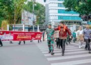 Tumbuhkan Semangat Kemerdekaan dan Jiwa Nasionalis, Wali Kota Medan Bagikan Bendera Merah Putih