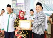 Plt Bupati Labuhanbatu Serahkan Zakat Kepada Masyarakat Rantau Utara