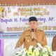 PJ Bupati Kabupaten Langkat H. M. Faisal Hasrimy, AP., M.AP saat pidato sambutan pada kegiatan Halal Bihalal Dinas Pendidikan Kabupaten Langkat, Selasa (23/04/2024). (kedannews.com/ist).