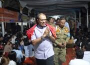 Hadiri PORSENI 2024, Pj Bupati Langkat Disambut Ribuan Permata GBKP Klasis Kuala Langkat