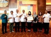 Langkat Raih Penghargaan Kabupaten Terbaik dalam Perluasan Akses Keuangan 2024