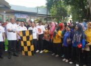 Pj. Bupati Langkat Faisal Hasrimy Lepas Ribuan Guru dalam Gerak Jalan Santai HUT ke-79 PGRI